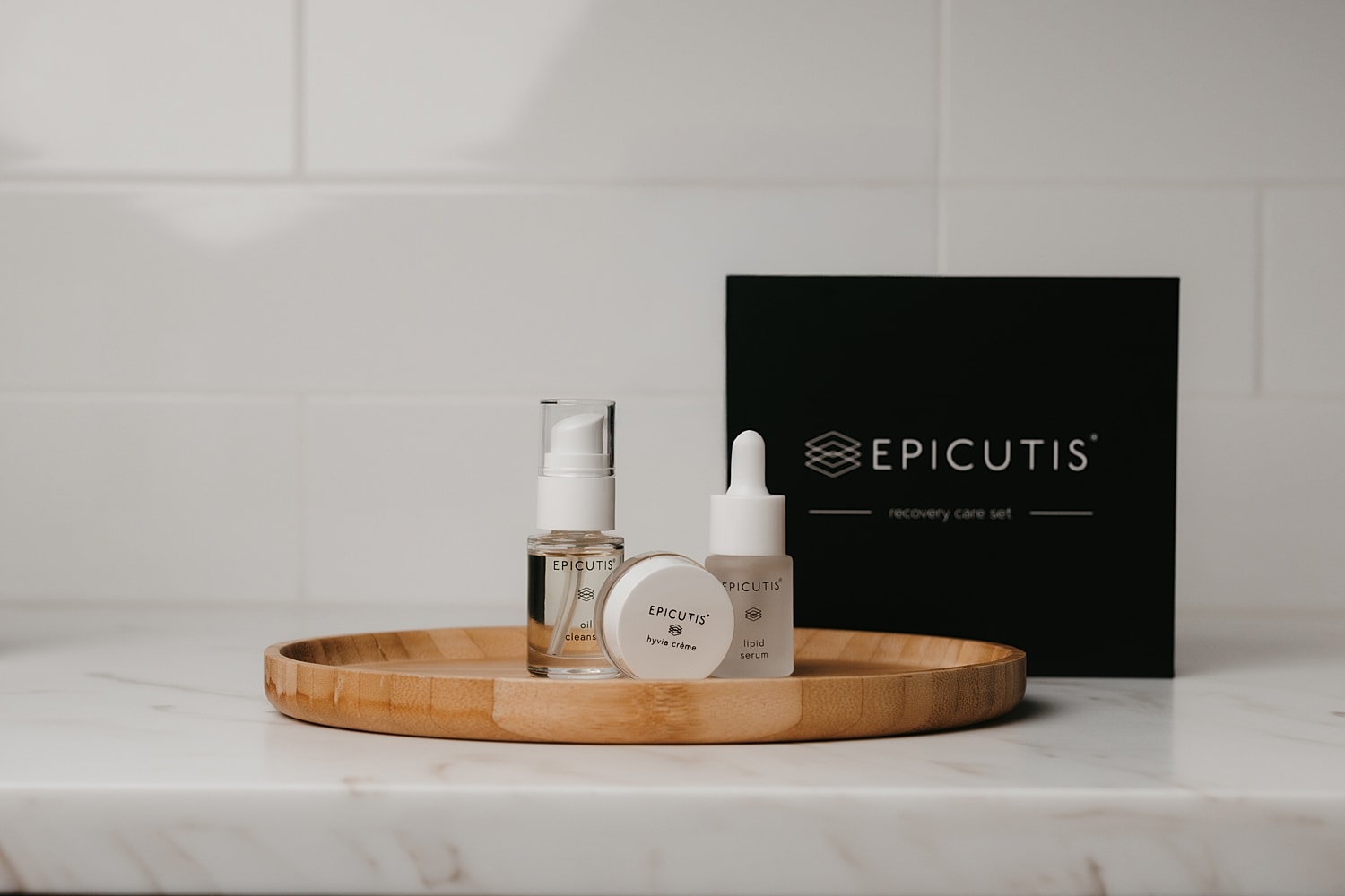 Epicutis skincare recovery care set on wooden tray.