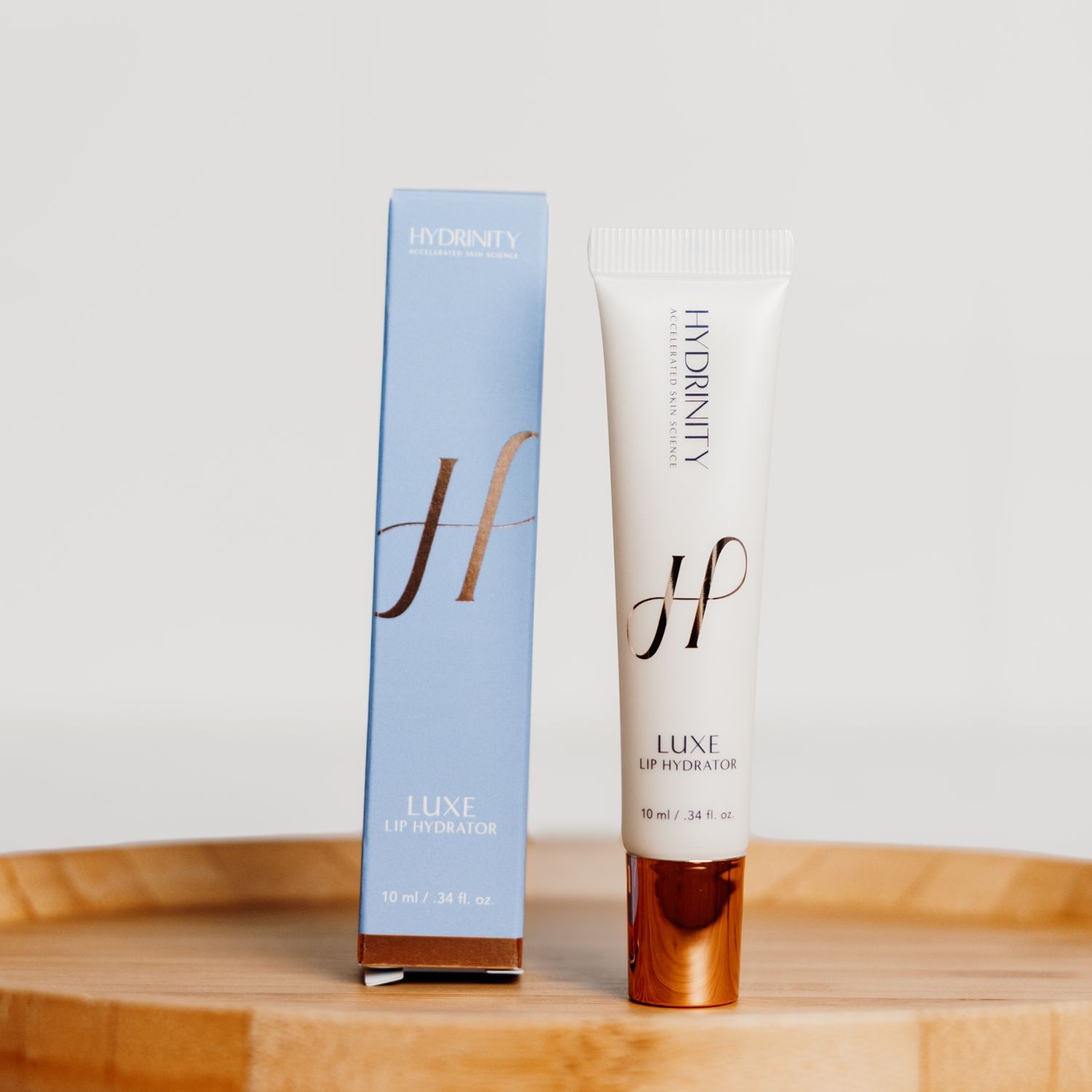 Jar of moisturizer splashing in water.