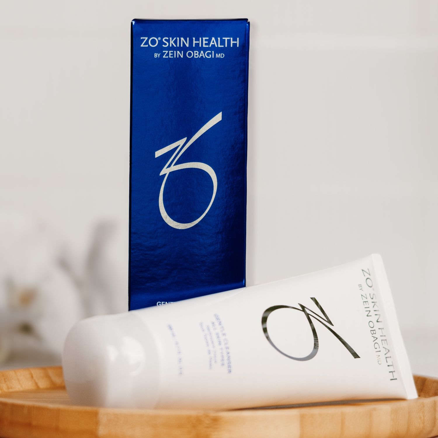 Glass bottles behind a fogged-up surface.