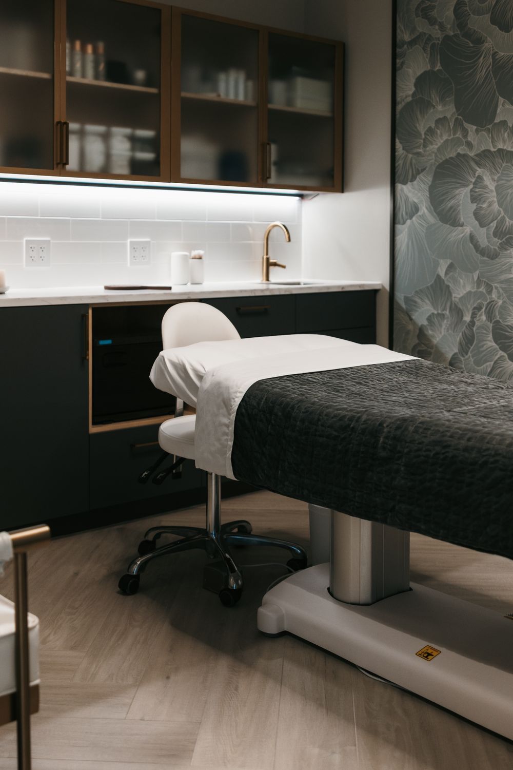 Man cleansing face with skincare product.