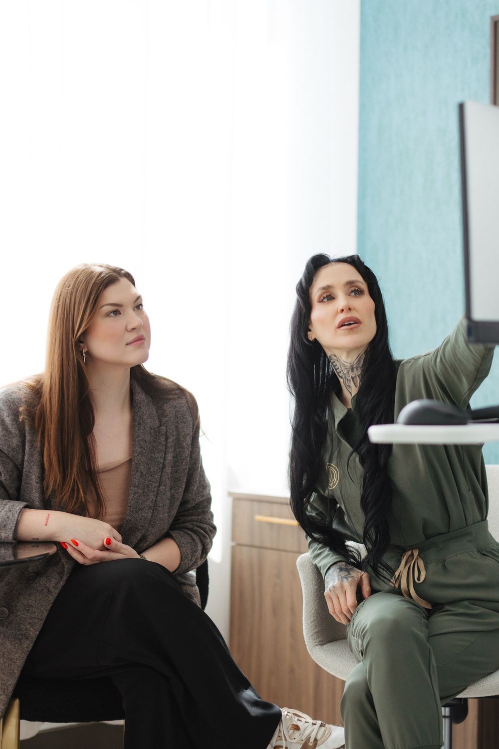 Close-up portrait of a person with braided hair.