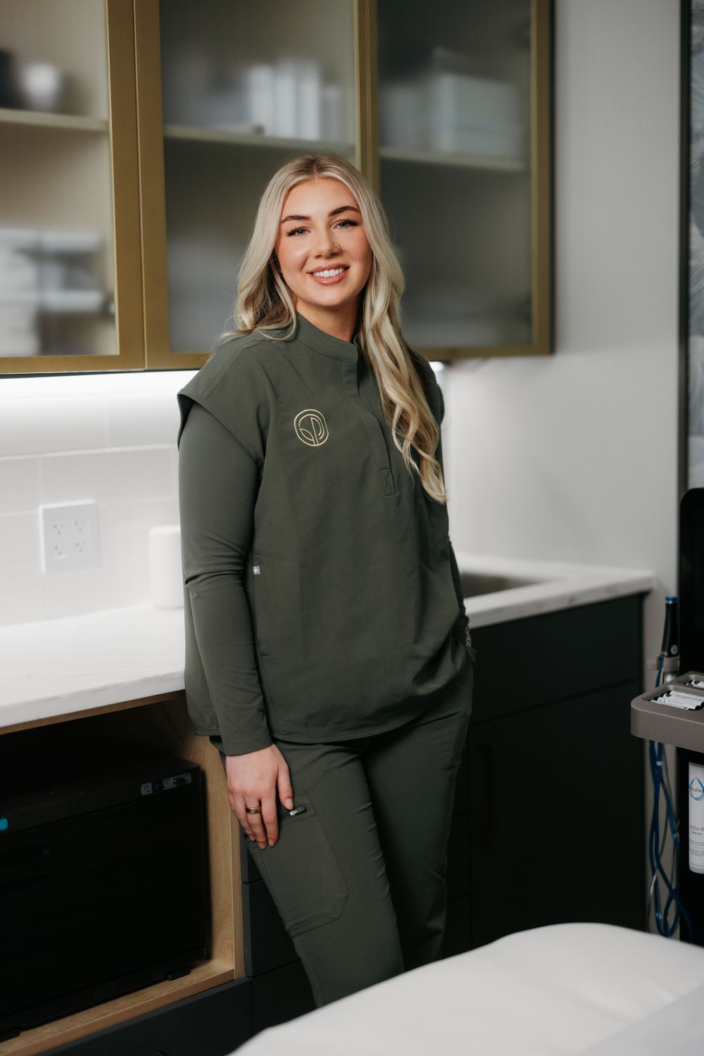 Woman applying cleanser to her face.