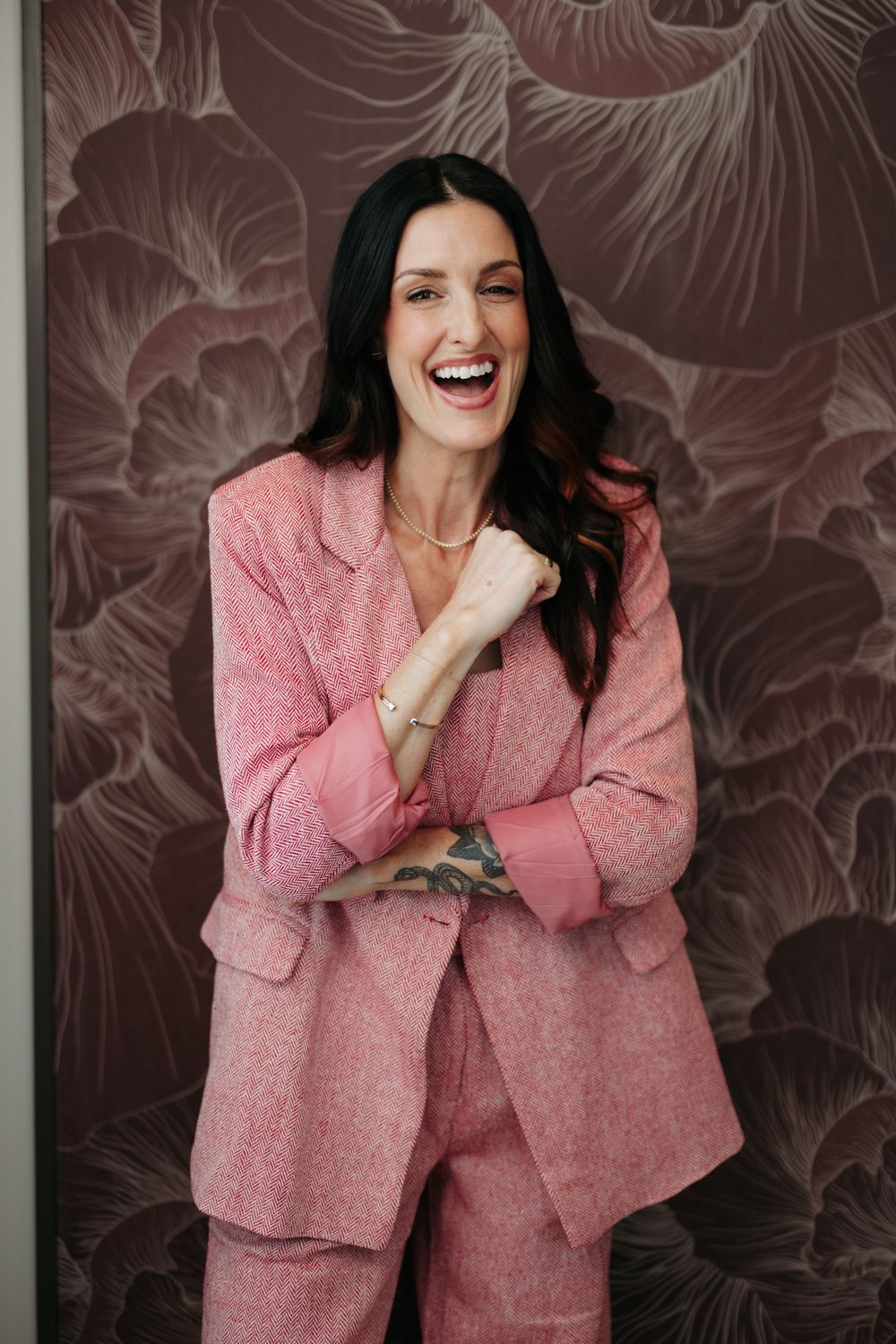 Model in blue athletic wear posing confidently.