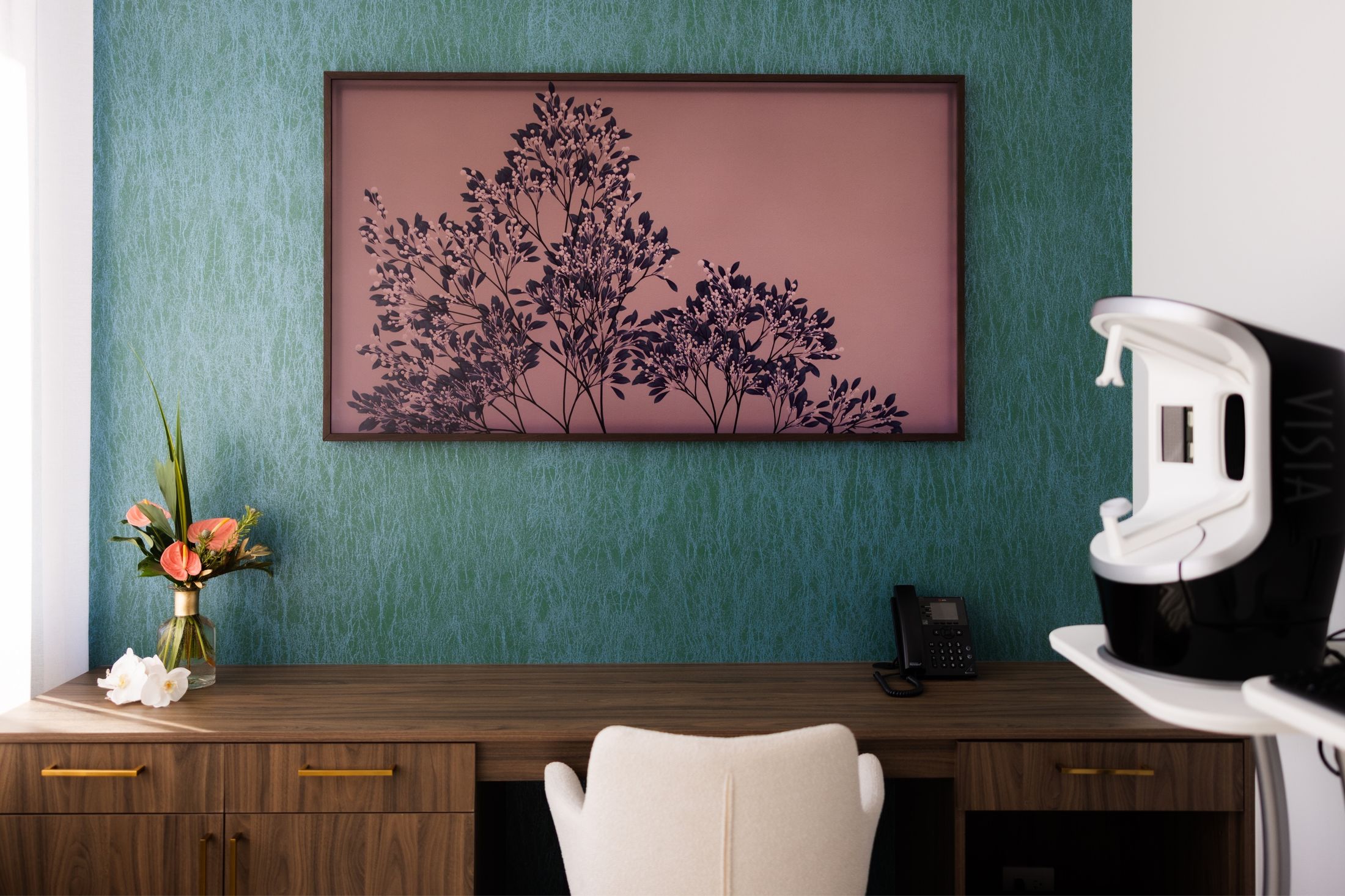 Minneapolis skyline with bridge at sunset.