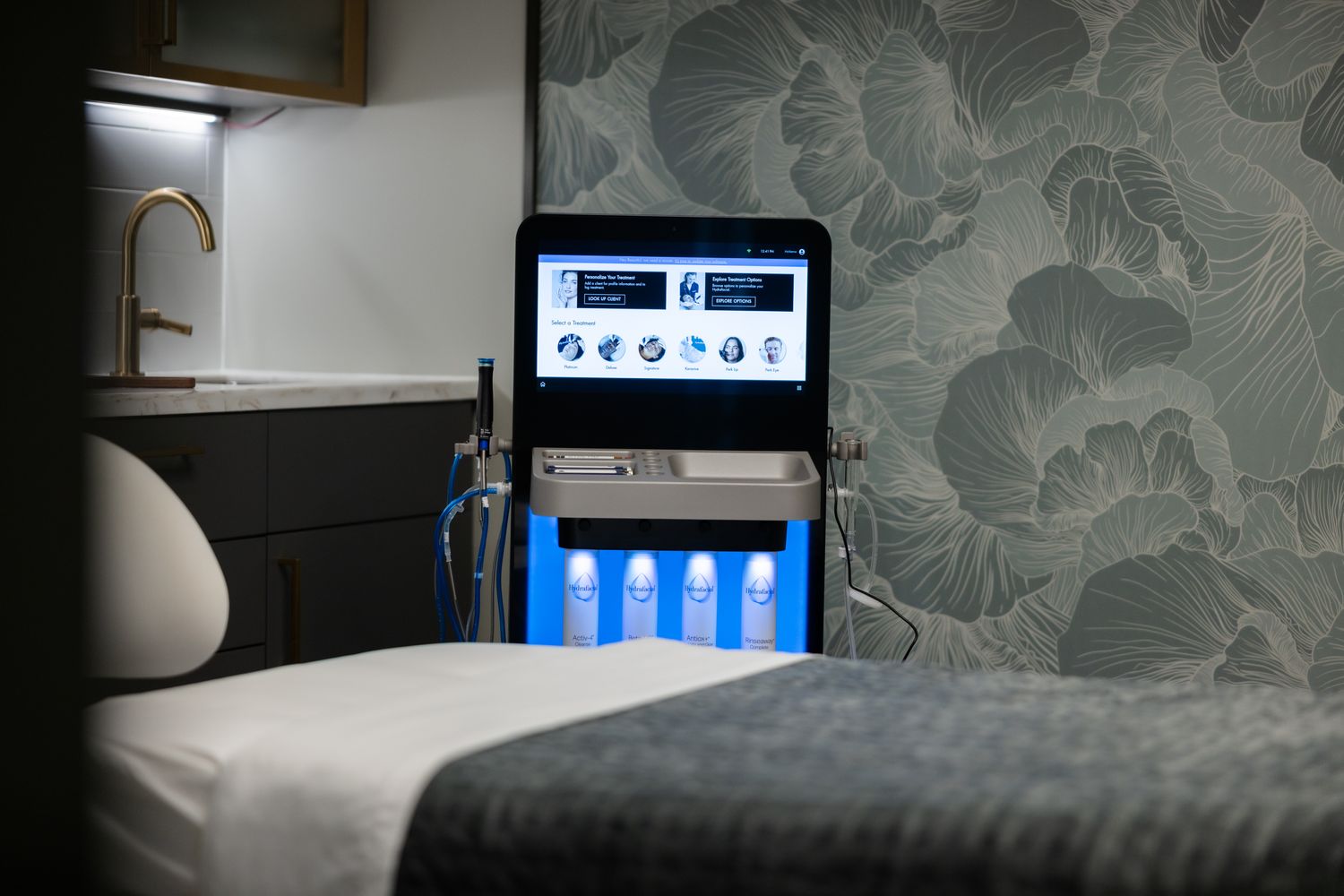 Smiling woman with curly hair outdoors.